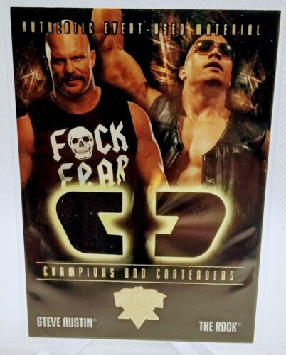 2004 Fleer WWE CCS-SA The Rock Steve Austin Authentic Event-Used Material Card