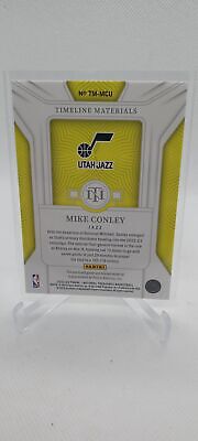 2022-23 Panini National Treasures #TM-MCU Mike Conley Timeline Materials #/99